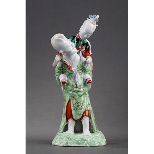 Rare figure Chinese porcelain representing a man carrying a lady on his back